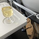 機内でのシャンパンとEn Liègeコルクバッグ